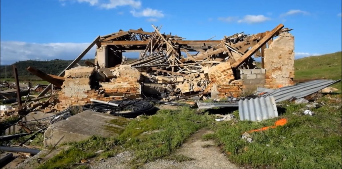 #1: likely F2 that severely damaged several stone/concrete farm buildings along with a few roofs, trees and power poles. A train was struck and two people were injuried when the windows blew out