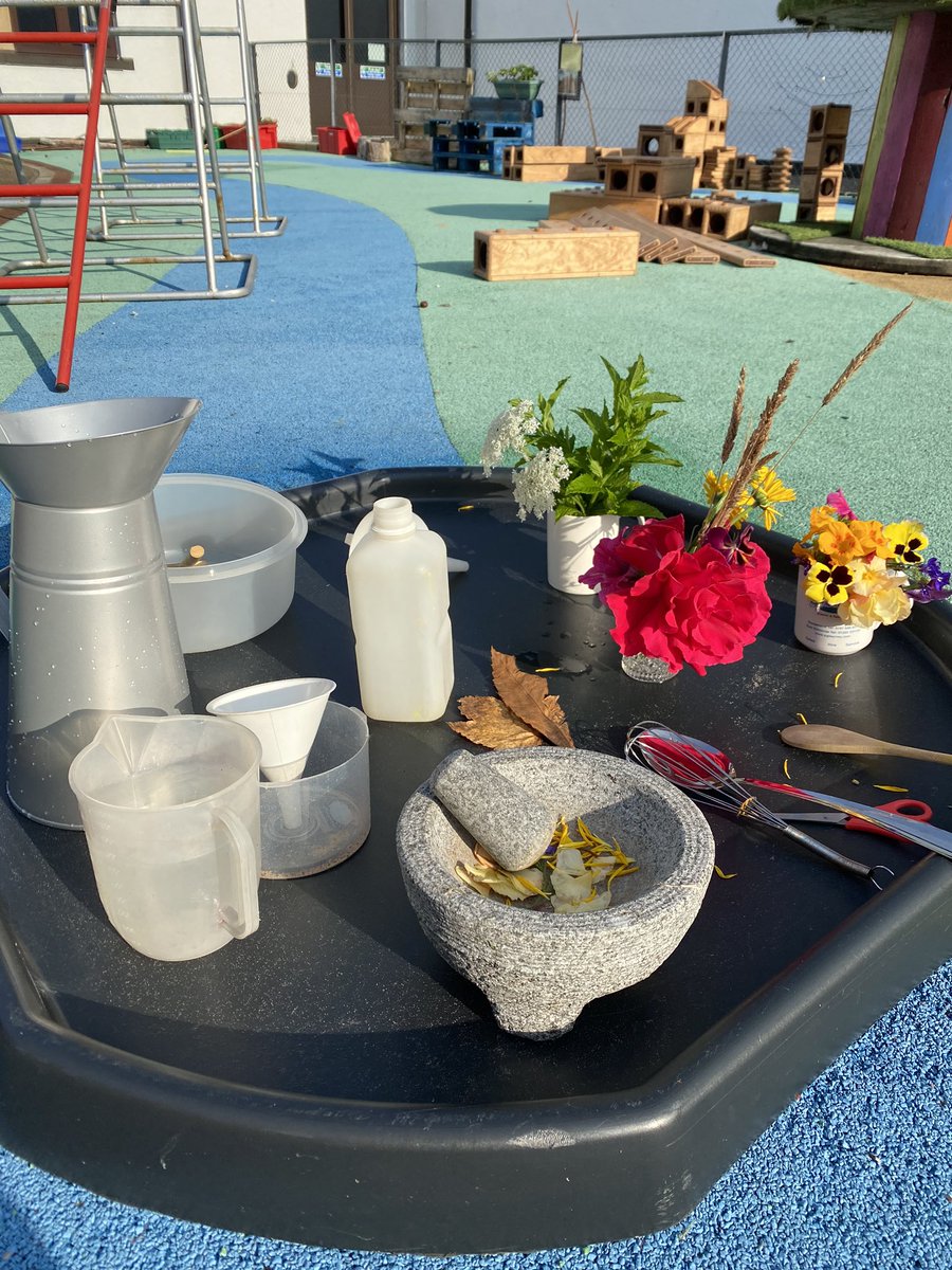 EypLaura's tweet photo. Potion making in the sunshine today. The children decided to add paint to the water too to colour it https://t.co/8MMOji2aIp