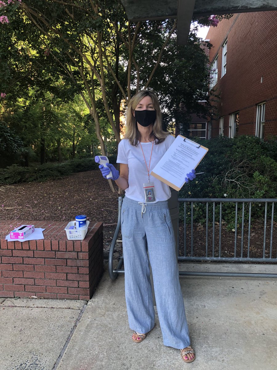 StmmNC's tweet photo. Nurse Walsh is busy screening our #MonarchTeachers for their first Workday of the 20-21 school year! #wepray #welearn #wecare #wescreen https://t.co/DMRSaGsxr1