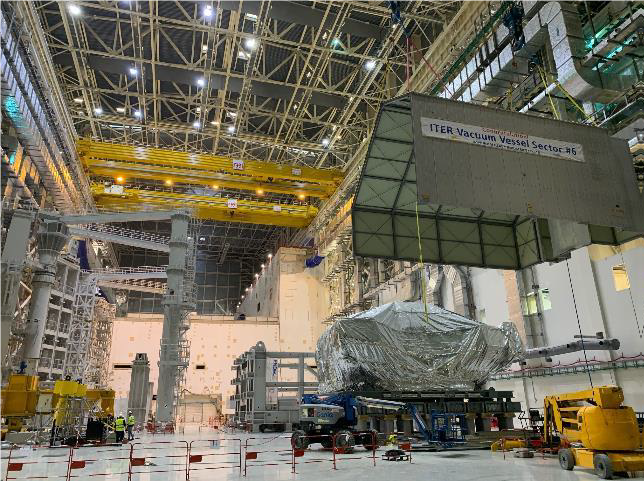 iterorg's tweet photo. An emotional moment for many at #ITER: the unpacking of #vacuumvessel sector #6 in the #AssemblyHall. It's the first of nine sectors that make up the chamber where fusion will take place. This one came from Korea. #ITERAssembly #WeAreITER #fusionenergy https://t.co/vEITkDmApC