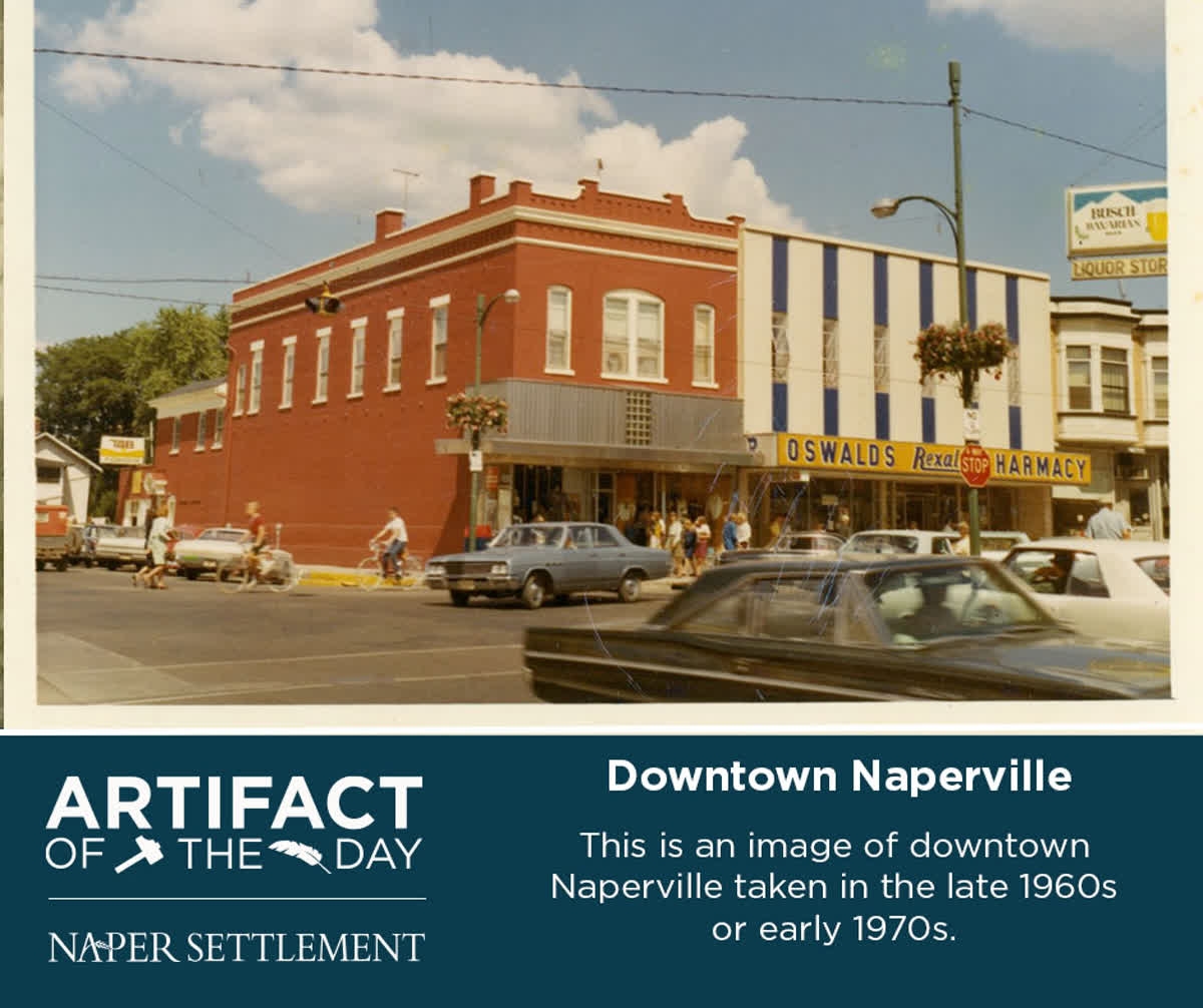 Do you recognize this corner of downtown Naperville? This is an image of downtown Naperville taken in the late 1960s or early 1970s. <a href="/oswaldspharmacy/">Oswald's Pharmacy</a>, pictured here, is still in Naperville today, located at 88 W. Gartner Rd. It has been in business since 1875!