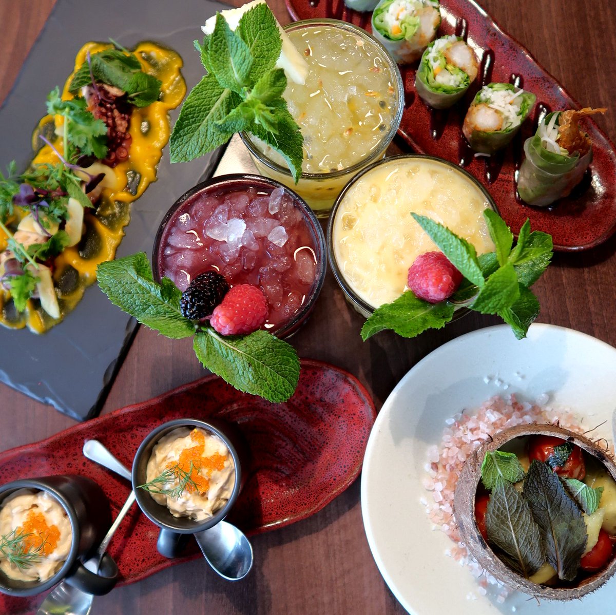 The perfect dinner in one picture. A selection of our traditional tapas and fruity cocktails.