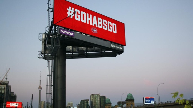 CTVMontreal's tweet photo. Habs billboard shines above major Toronto expressway as playoffs continue Leaf-less https://t.co/PSegrzpYa2 https://t.co/h6hnHc1gxp