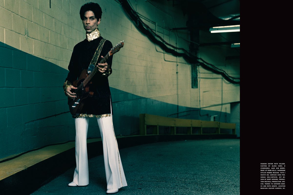 Over the years Prince has worn variations of tunics from dazzling coin encrusted fitted tunic to digitally printed polo-necks. He adapted the style adding lace up detailing, sheer panelling, opulent textiles & embellishments such as gold coins.