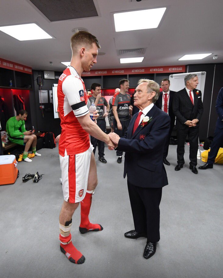 Image: Arsenal director Ken Friar congratulating Arsenal captain Per Mertesacker after the 2017 FA Cup final win over Chelsea. ❤️ [<a href="/Stuart_PhotoAFC/">Stuart MacFarlane</a>] #afc