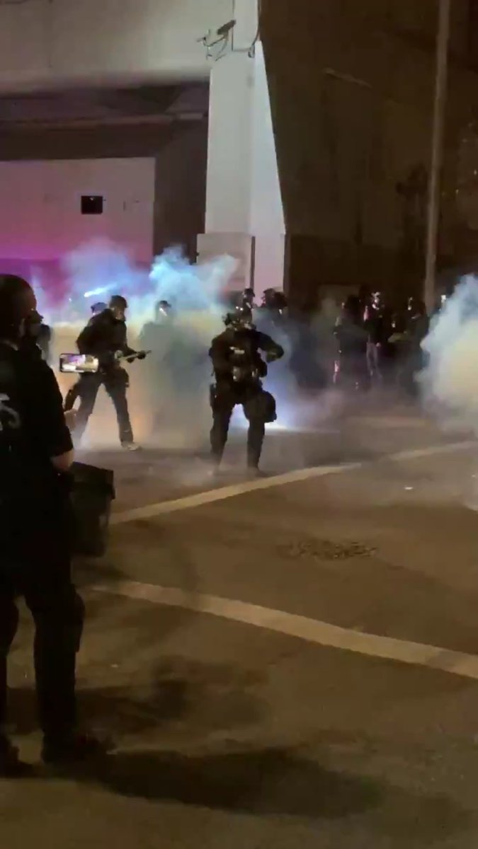 Two nights ago, when  #PortlandProtest was at the E. Burnside precinct,  @PortlandPolice stayed inside. No arrests were made, no tear gas deployed. Last night, downtown. Same protesters, same vibe. But police turned the streets into a war zone. Could it be that the Police reaction-