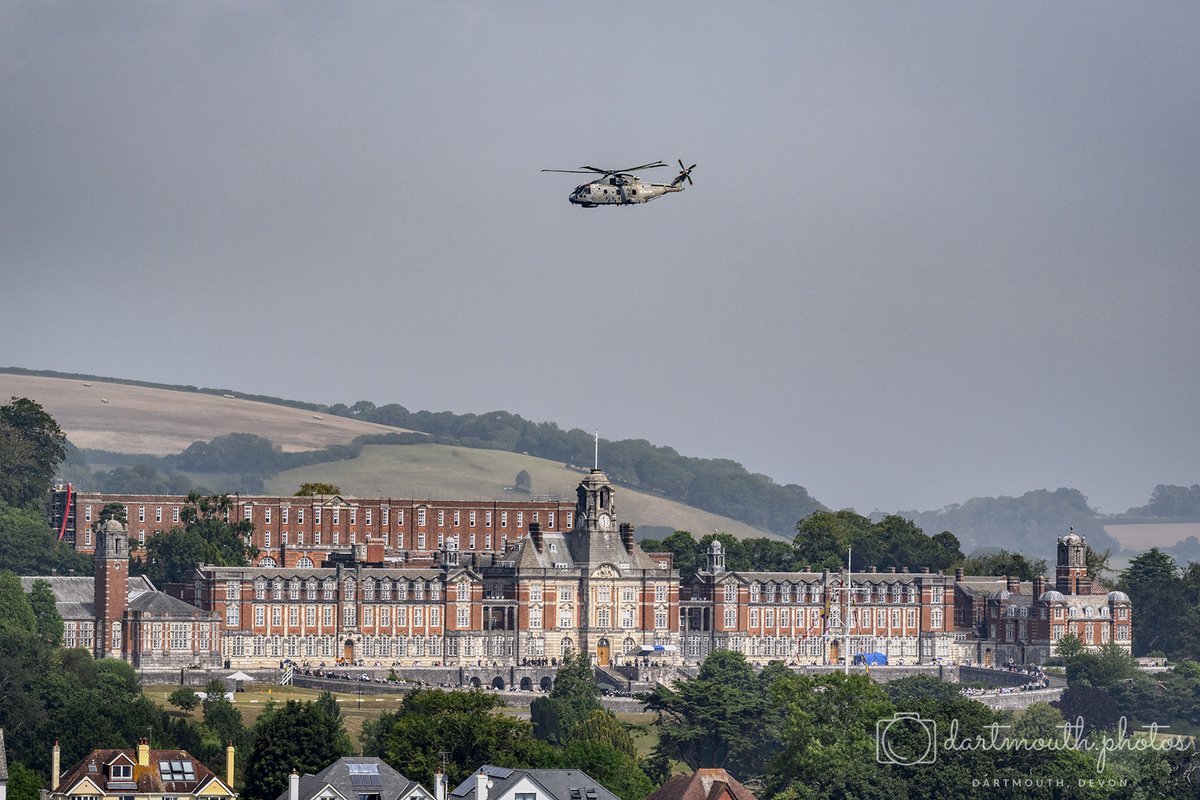 dartmouthphots's tweet photo. Today's flypast by a Merlin helicopter during the Passing Out Parade.  Todays parade marked the Passing Out of not only the Officer entry but the first Ratings to be trained at BRNC.  @RoyalNavy @CaptainRReadwin @DartmouthBRNC   #Dartmouth #Devon https://t.co/FR3iwSk8pV