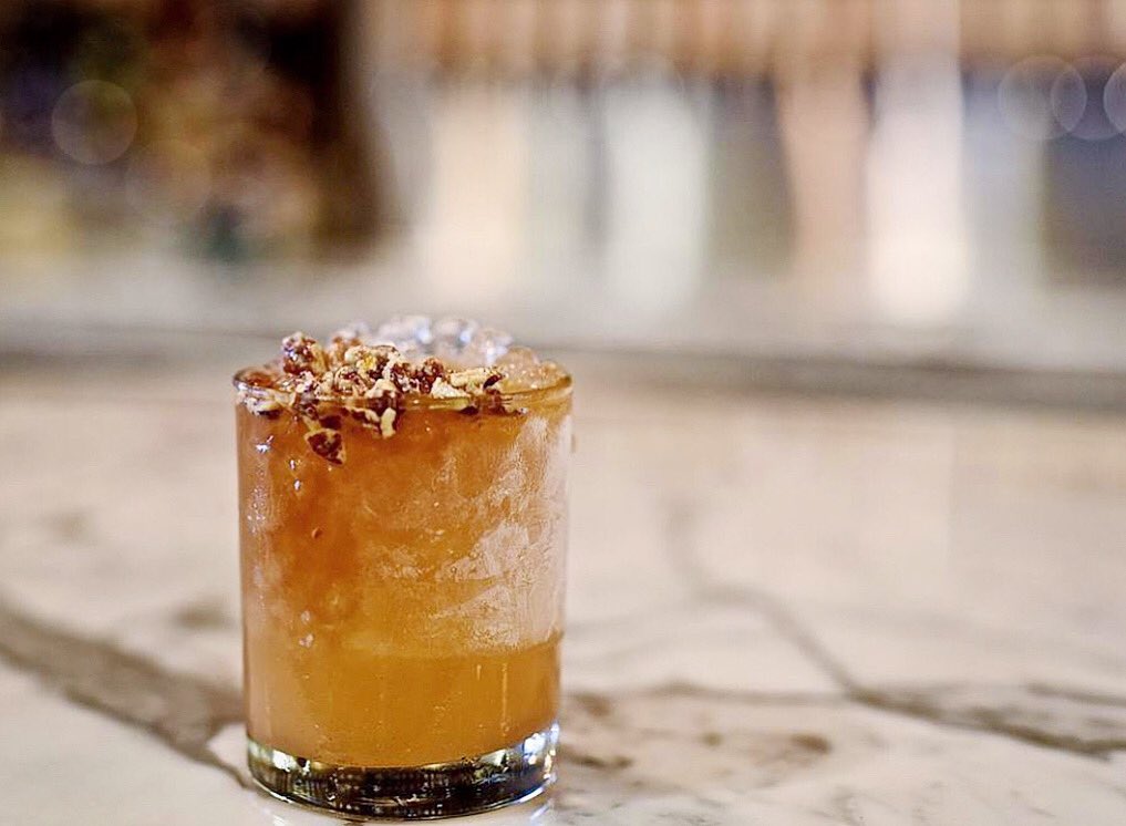 #HappyHour is back in the bar M-F, beginning at 4 pm. 🥳 Enjoy $8 craft cocktails like the Nuts &amp; Bolts, made with our house-made pecan orgeat, $8 martinis, $6 glasses of wine + food specials! Available at both Pearland and Woodlands locations. #pearlandtx #bourbon #woodlands