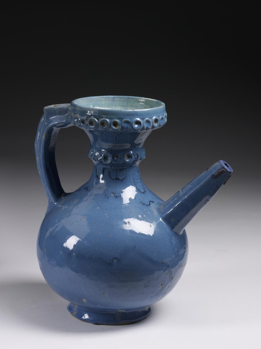 I should also note that this type does have a Safavid precedent, produced in the monochrome style. These worked in much the same way, with the ice going in through the neck, and the liquid being poured in through a hole in the top of the handle. (V&A 2643-1876 & 614-1889) [7]
