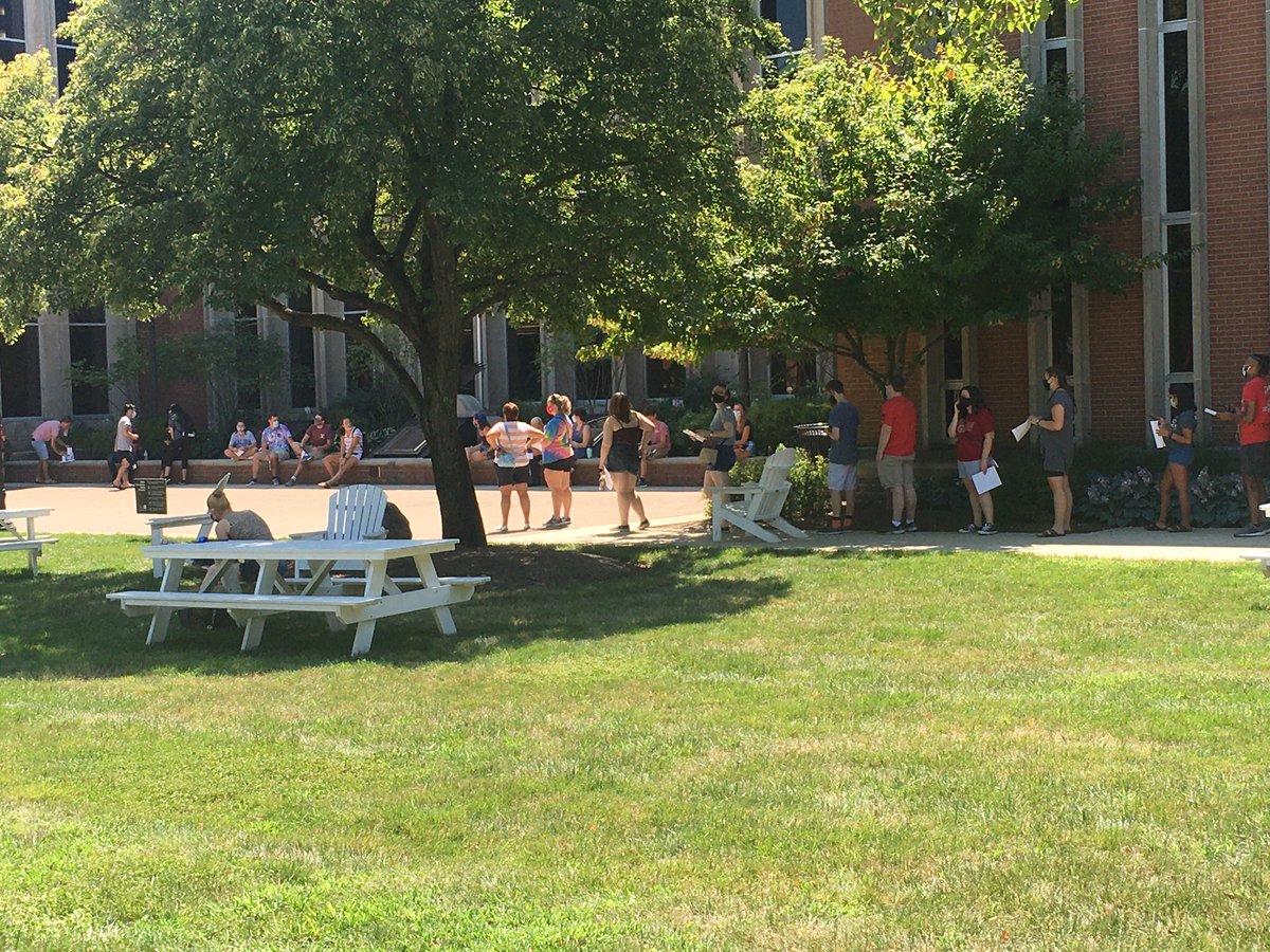 Rock_Jones_'s tweet photo. Theyβre back! Students at check-in under the tent and in line for COVID testing on the Beeghly Library porch. Remember when tests at check-in were for course placement? A different year but the same good feeling with students back on campus. #MasksEverywhere #agreatdaytobeabishop https://t.co/ituGPDkERG