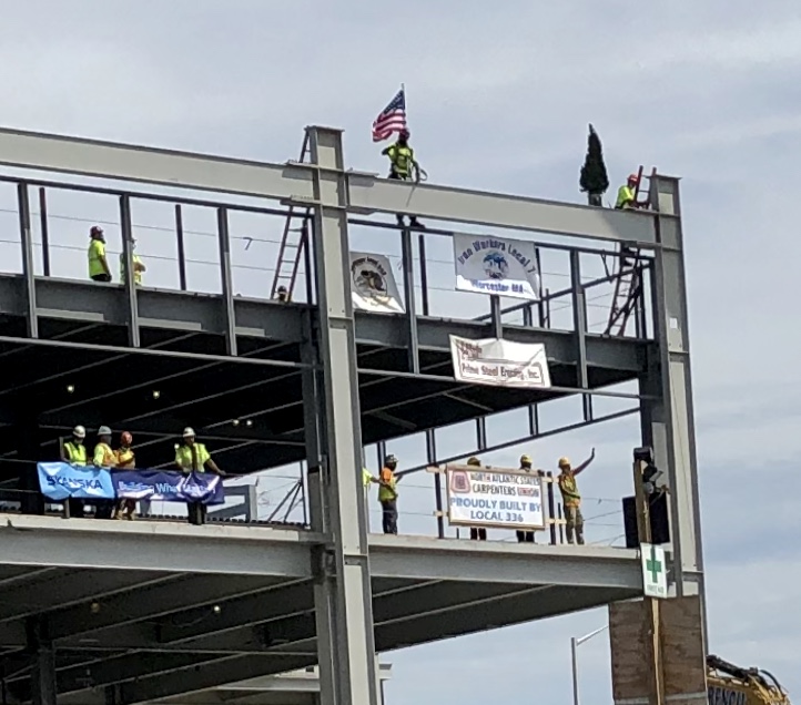 TweetWorcester's tweet image. The final steel beam was raised at @PolarPark2021, future home to the @WooSox, Thursday, Aug. 13 in a ceremony that featured city and team officials, laborers and many others. #toppingoff #Worcester