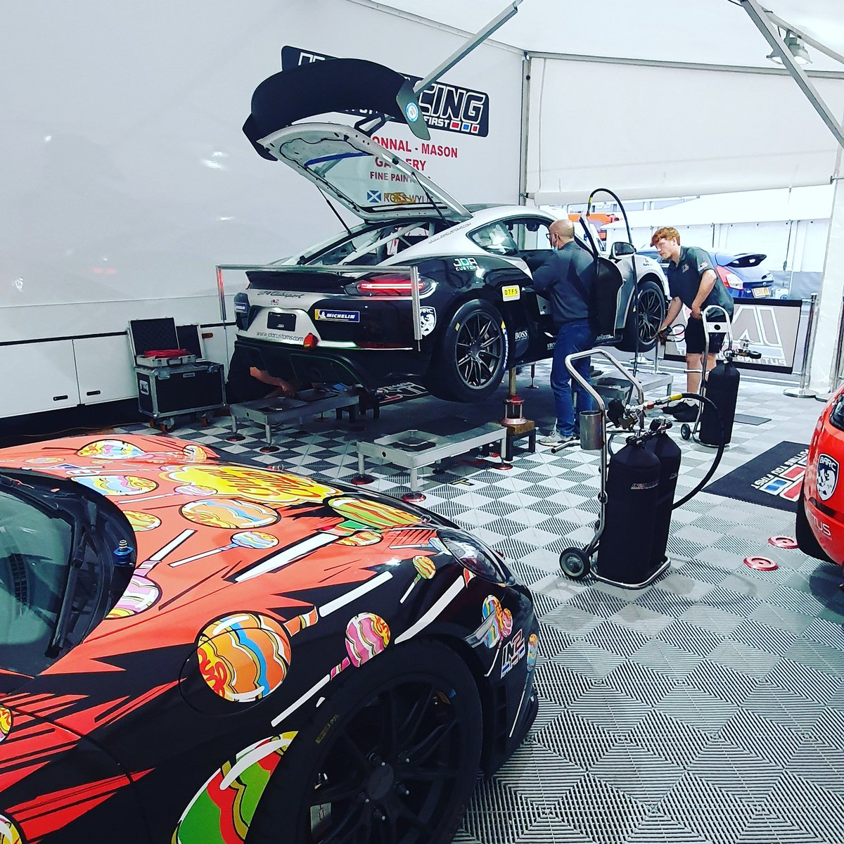 In2Racing's tweet photo. The Championship leading Cars of @JamesDorlin and Ambrogio Perfetti are getting fine tuned for @PorscheRacesGB ahead of tomorrow's test @DoningtonParkUK #SprintChallengeGB #In2racing #P1 https://t.co/ZllkK1517w