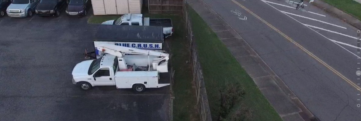 This is the OCU/MGU cherry picker they use. They just put a magnetic MLGW or AT&T or whatever magnetic logo on the side and it looks official. The person who saw the removal described this vehicle. *Pick Taken at Organized Crime Unit Headquarters.