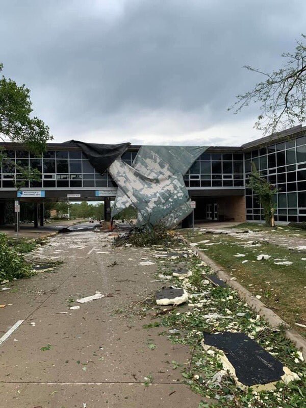 CRJeffersonHigh's tweet photo. Twitter access! JHS lost many trees &amp; our skywalk  its roof. We have exterior &amp; interior damage. Thanks Supt Bush &amp; Principal Hawley for photos. We do not know when but WE WILL BE BACK!  keep helping your neighbor, stay safe, we will move through this together. 
#jeffbleedblue https://t.co/Z14I8bySpB