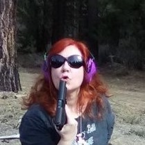 Rynne Cowham's old facebook profile photo shows her with a gun.Looks like she was doing target practice and decided to blow off the barrel of her gun, maybe.This pic is relatively lighthearted. In other posts, she discusses guns and violence in a more threatening way.