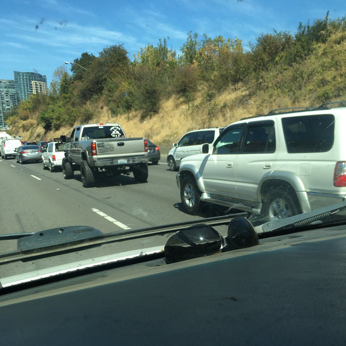 PeeingSpecies's tweet photo. #pdxfashcar seen entering the city via I-5 10 minutes ago. Washington plates C455991 and crossed gun sticker with βI donβt call 911β #PortlandProtests #BlackLivesMatter https://t.co/QIS3ICZFrP