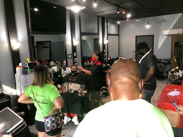 Tiffany at Tiffany's Barber Shop on Asbury has been cutting hair in STP for 20 years. The Community Ambassadors Midway team regularly checks in w/her on their normal route. Her shop is a safe place for neigbh kids & a few were even waiting to get a fresh fade when we stopped in
