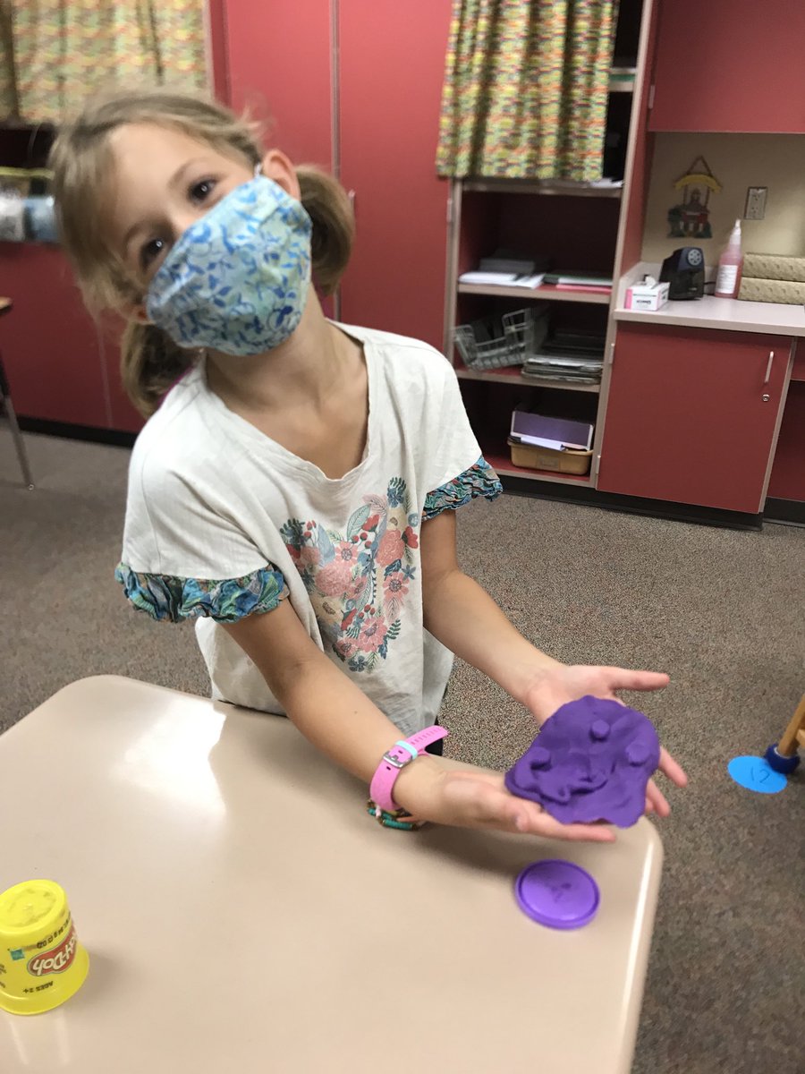 We made emojis out of Play- doh to express our feelings about coming back to school.  Everyone made a happy face emoji.😃