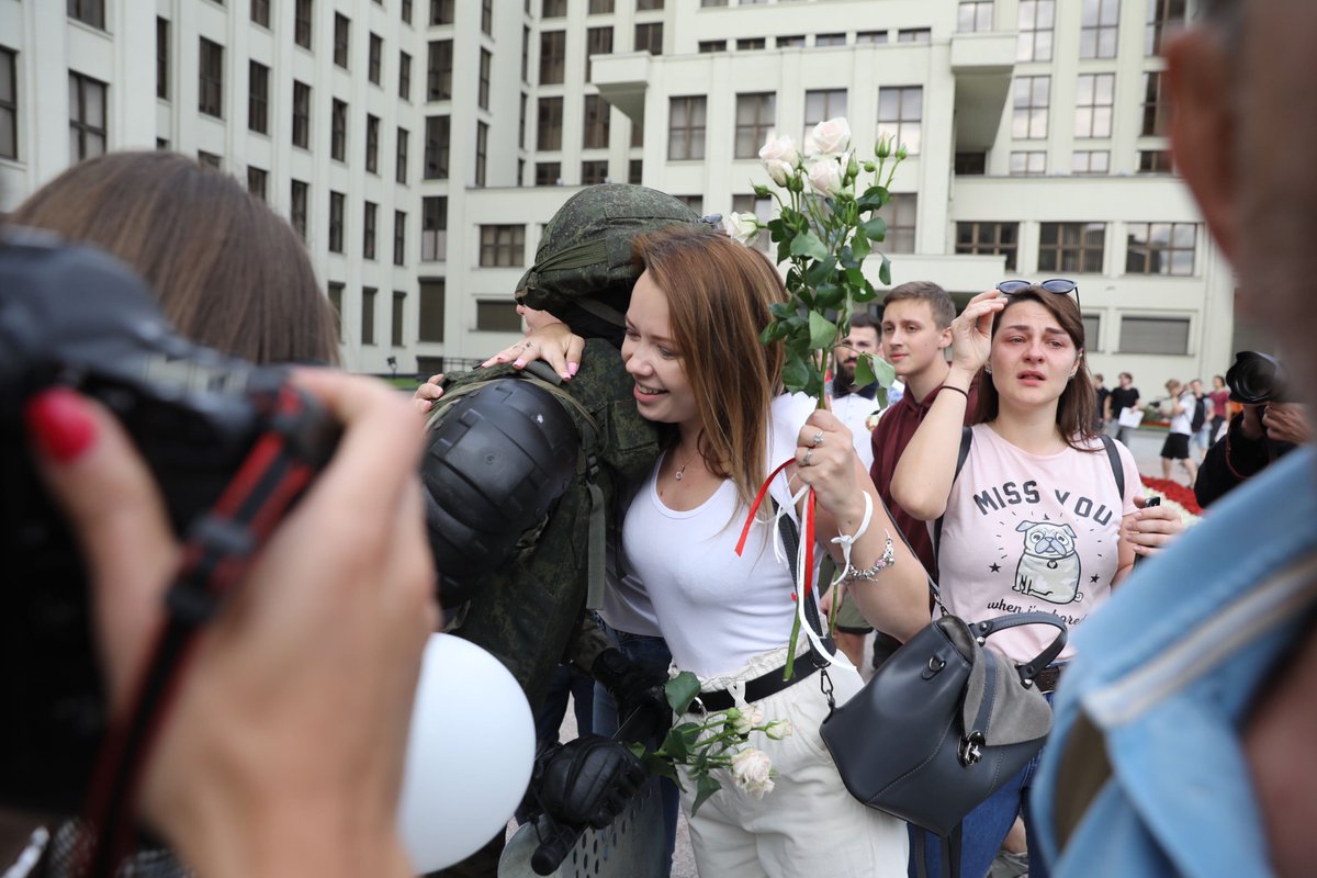 The spontaneous rally of 10 thousand reached the Independence square. 14 soldiers are in front of the house of government. They put shields on the ground. Thus supported the protest. Female protesters began hugging them. It's so emotional!