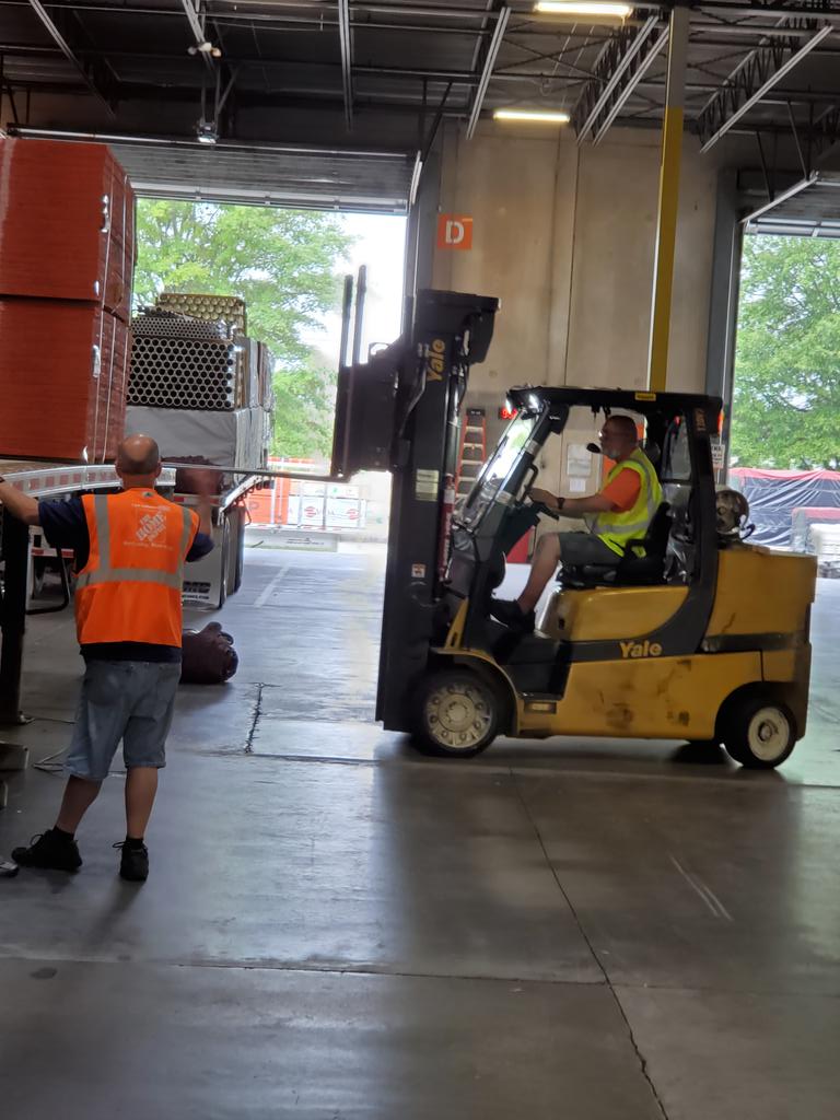 Eric on MET is learning how to load a DC lumber truck.  Getting Ready to help out with hurricane if need be.