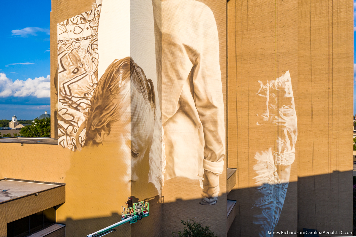 #Drone view: Shots of the Quido van Helten mural being painted on the Canvas building in <a href="/Greenville_SC/">VisitGreenvilleSC</a>.