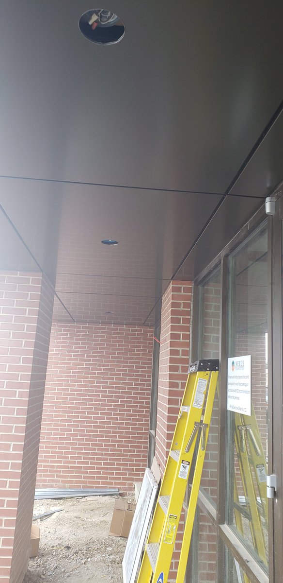 FairfieldMetal's tweet image. The Poplar Apartments finished canopy highlights the entrance. The SBR-Bronze #Alpolic is approximately 300 square feet #metalfabrication Arcitect @BlackneyHayes