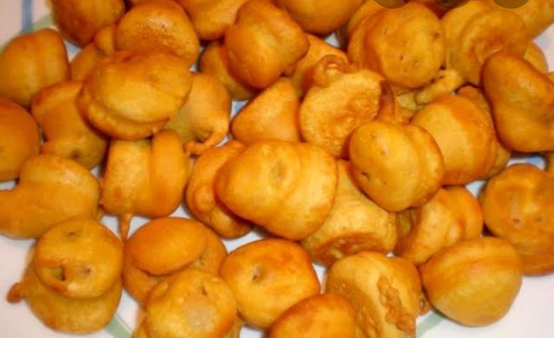 7. Bari: Bari is round shape fritters made with only besan flour mixed with Turmeric n salt. Bari is a must for auspicious occasions and Bihari kadhi isn't cooked without this Bari.