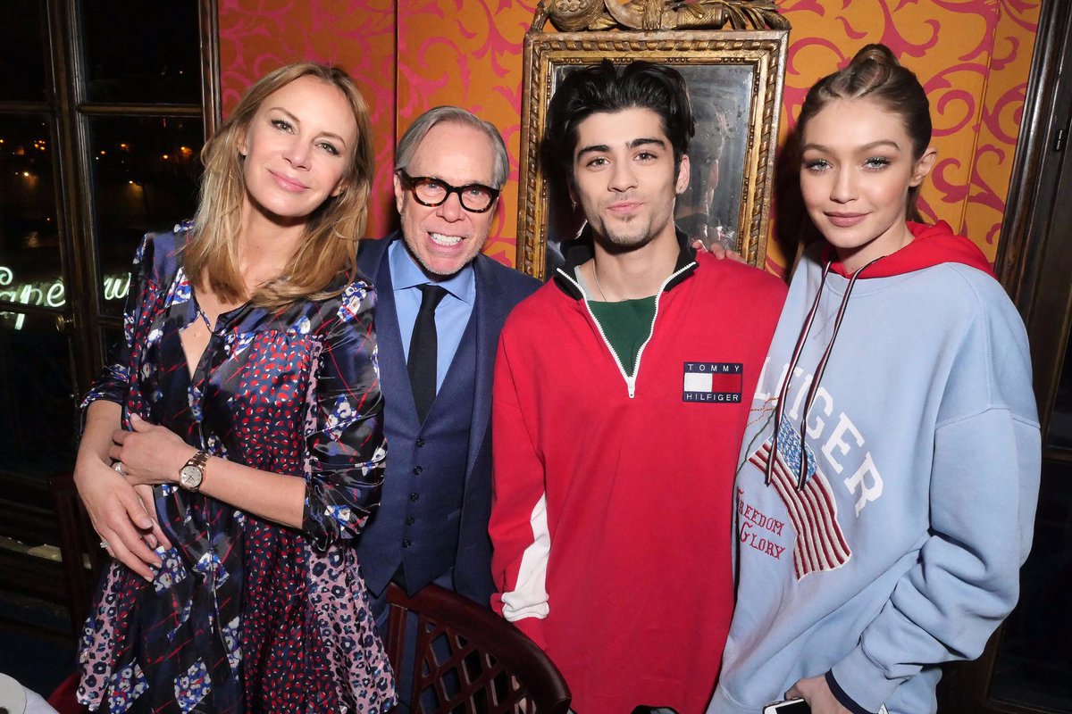 14. Matching outfits during the celebration of Gigi's second collection for the Tommy Hilfiger brand in Paris