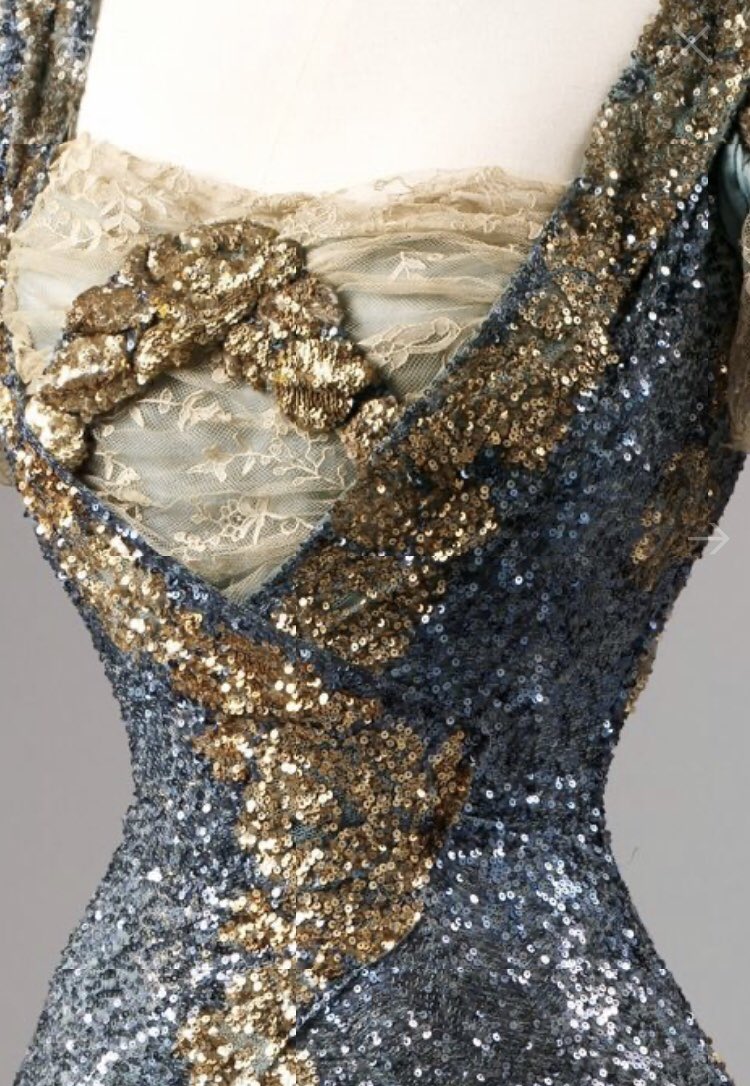 LaurenCDeutsch's tweet photo. This week’s #fridayfrills is this beauty! It’s a 1805-1910 evening dress. This is one of my favorite dresses. The color. The detail. The sparkle. Absolutely fabulous. It’s unknown who made it but it was worn Queen Maud of Norway 🇳🇴 #fashionhistory. https://t.co/1fH0teOjLC