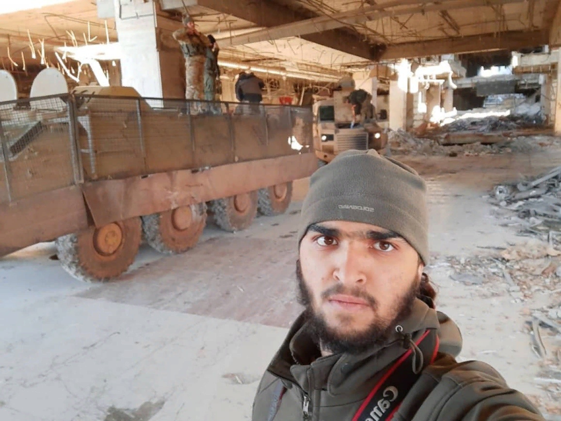 4. Another image from January at probably a different assembly area (West Aleppo) shows a BTR-60 PB (ID'd by side rails), with added cage armour and a rubber side skirt. Its different vehicle from the first 2, as no break in the cage for the side hatch. So where is the entrance?