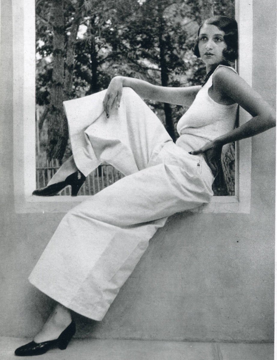 #FabulousFashionFriday When legendary #French photographer #JacquesHenriLartigue met #ReneePerle in #Paris in 1930, he captured her elegant, advant-garde style in countless photographs over their two year relationship. #palazzopants & a #tanktop w/#heels #style