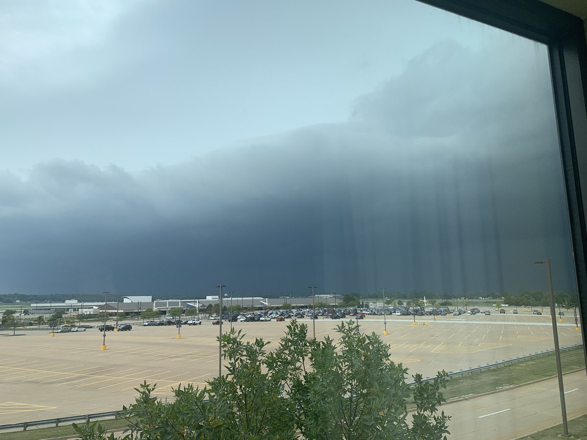 Through my hotel window, which looked directly out at the airport, I saw the storm’s approach, then watched as it lashed the airfield, laying the tree in front of my window nearly flat, shredding flags on the airport’s flagpoles, and knocking out out the hotel’s power.