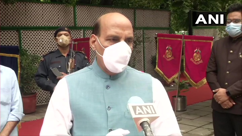 ANI's tweet photo. Delhi: Defence Minister Rajnath Singh unfurls the national flag at his residence. He says, "We will get freedom in its true meaning when India becomes self-reliant. So today we need to take a pledge to make India self-reliant." #IndependenceDay2020 https://t.co/TbpNhA3kYu