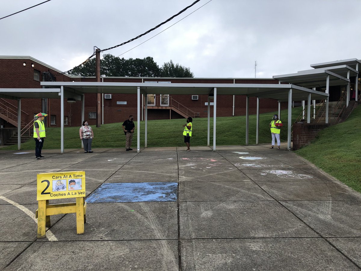 _stephaniemason's tweet photo. WES staff members greeted students as they arrived this morning.  Everyone was wearing a mask, but you still knew they were smiling.  Thanks for all the planning &amp; preparation that went into providing a very smooth start to the 20/21 school year. https://t.co/J89DKKTF4K
