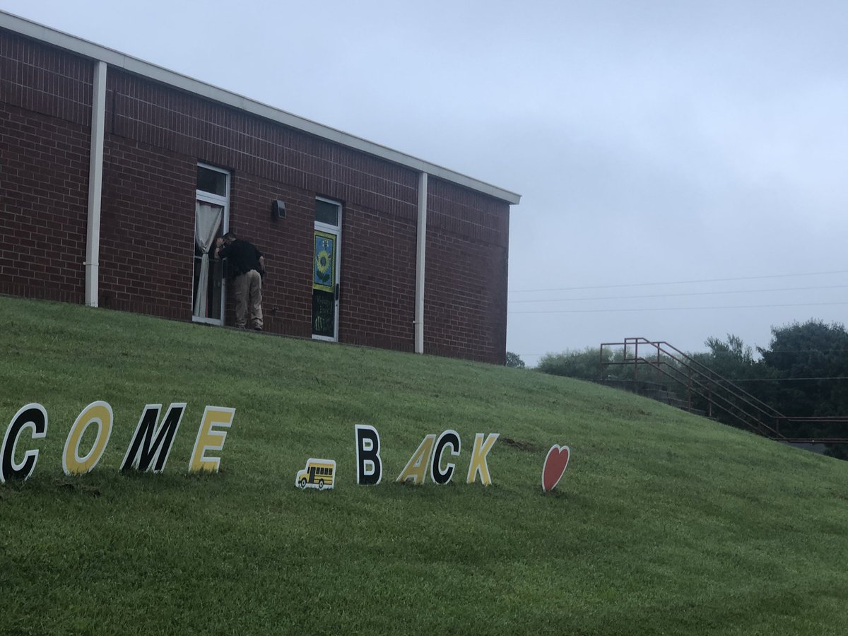 _stephaniemason's tweet photo. All in a day’s work - SRO Chris Baum greets WES students when they arrive and checks every door in the building.  Thanks for keeping us safe.  Thanks for taking time to build relationships. https://t.co/aNwLCn0vmJ