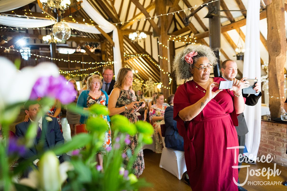 I just love the reactions of the wedding guests, they're always just as excited as the bride and groom and love taking photographs to capture the special day. Here's a photo from Sharon and Kenneth's summer wedding at <a href="/Ploughatleigh/">The Plough at Leigh</a>.

#wedding #weddingphotographer #photographer