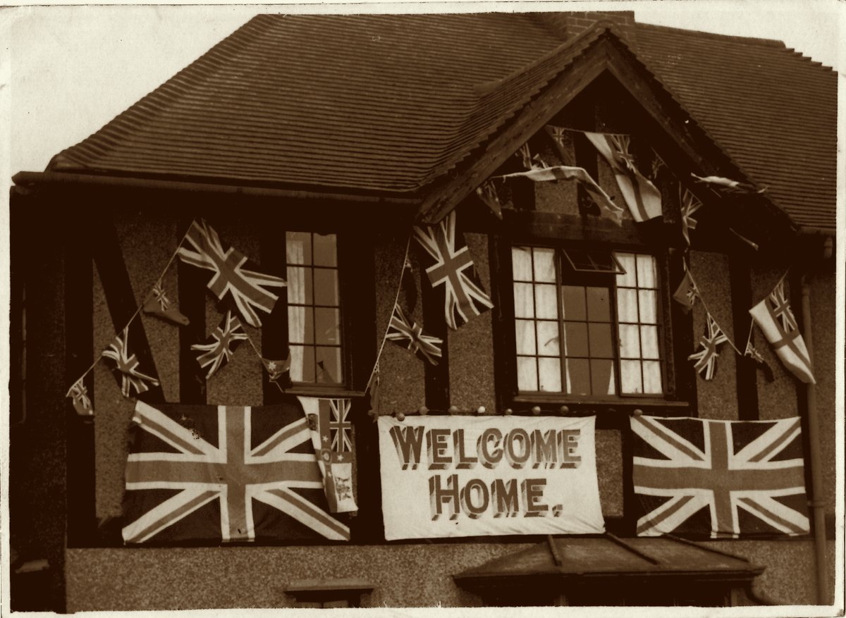 After more than three years away, Ernie finally arrived home in October 1945. His wife had decorated their house for the occasion. She even photographed it. Ernie Beech has simply captioned the photo ‘Home. Worth fighting for’.