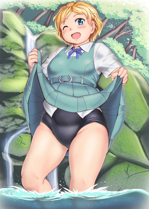 水辺で遊ぶ女の子は準備も万端。 