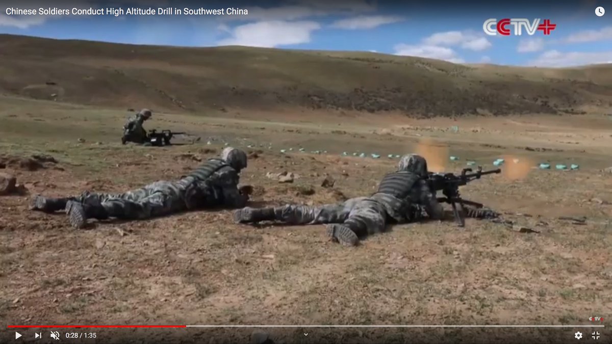 This QJZ-89 heavy machine gun is giving the assistant gunner a concussion.The muzzle brake--fitted to keep the gun from rising--is sending the muzzle blast right into the guy's head.