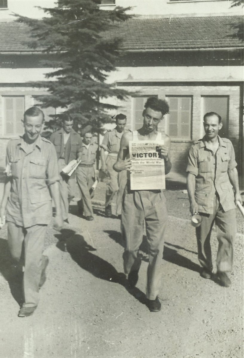 uncleblob's tweet photo. One of my favourite pictures of our dear Dad, Victor Shewry, with his great friend Spike Milligan, on the original VJ Day in 1945. Still in Italy 3 months after VE Day, but they can finally think about going home again after 6 long years of war. https://t.co/rAUOQIGrzy