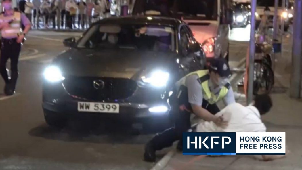 hkfp's tweet photo. Video: Hong Kong democrat Ted Hui tackled by police after confronting vehicle he said was following him 

https://t.co/rUDdT42q6s https://t.co/U7qOztZyba