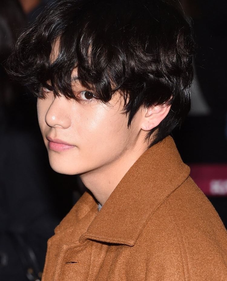 kim taehyung with curly hair and a brown coat  #ExaBFF  #ExaARMY  @BTS_twt