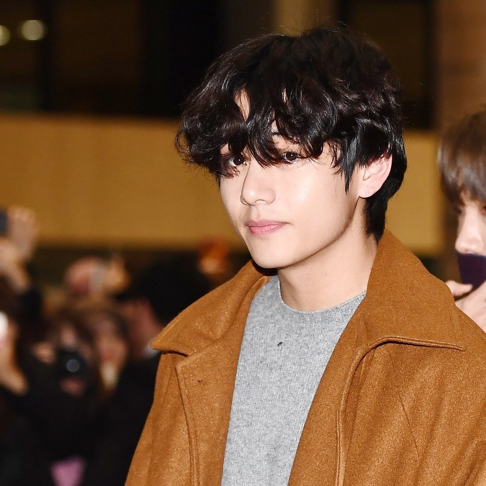 kim taehyung with curly hair and a brown coat  #ExaBFF  #ExaARMY  @BTS_twt