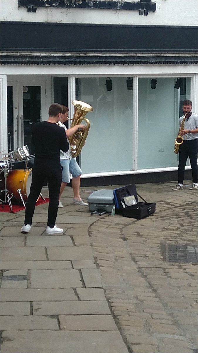 Live music going on very loudly and joyfully in Silver Street today.