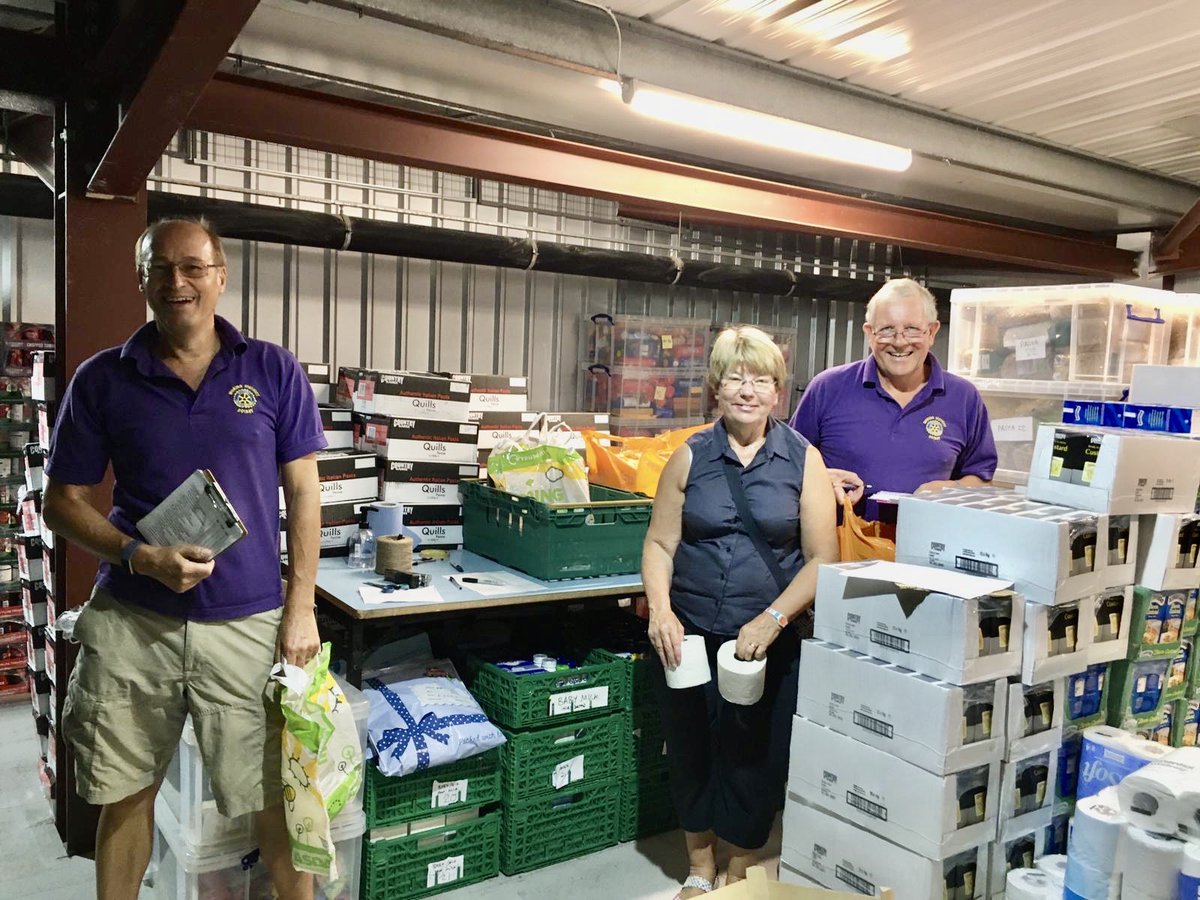 wokingdrotary's tweet photo. It may be Saturday, but Rotarians are still busy packing (socially distanced in household groups of course) food deliveries on behalf of @WokingFoodbank for distribution to clients this afternoon https://t.co/aWl928rY9N