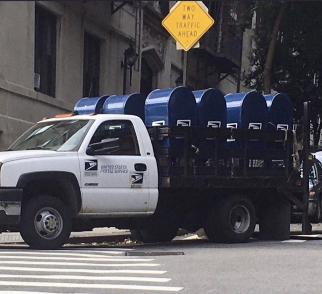 So this is America. Pay attention... mailboxes are being removed before the election. To drive deliveries, tell your friends to text USPS to 50409 or DM USPS to <a href="/resistbot/">Resistbot</a> on Twitter or Messenger! rs.bot/om_uZN