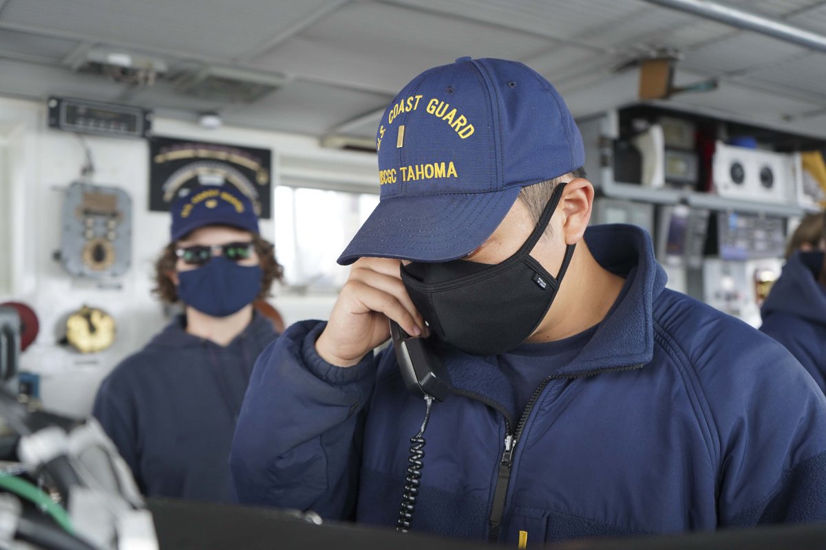 Ensign Justin Kang from <a href="/USCG/">U.S. Coast Guard</a> Cutter Tahoma returns communications to the #HMS #GLACEBAY and the MV #ASTERIX #Arctic #USCG #partnership #operation #OpNANOOK