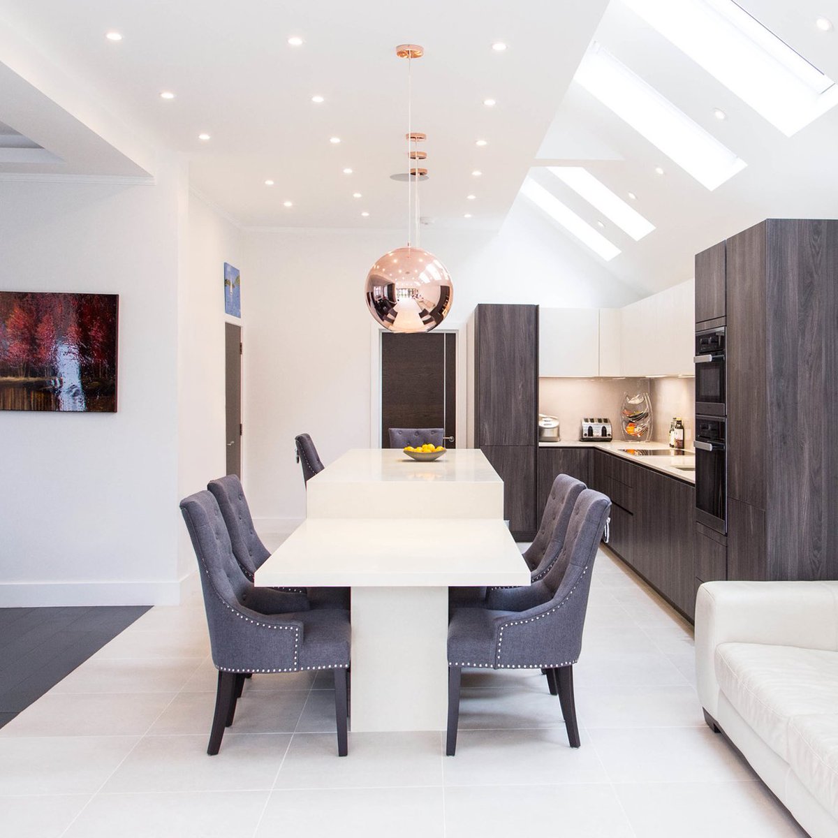 VogueKitchens's tweet photo. We designed this gorgeous open plan kitchen using cashmere and dark wood tones - the colours run from the kitchen to the dining room which bring the two spaces together 🤎 #luxurykitchens #homerenovation https://t.co/3gLocmSBDo