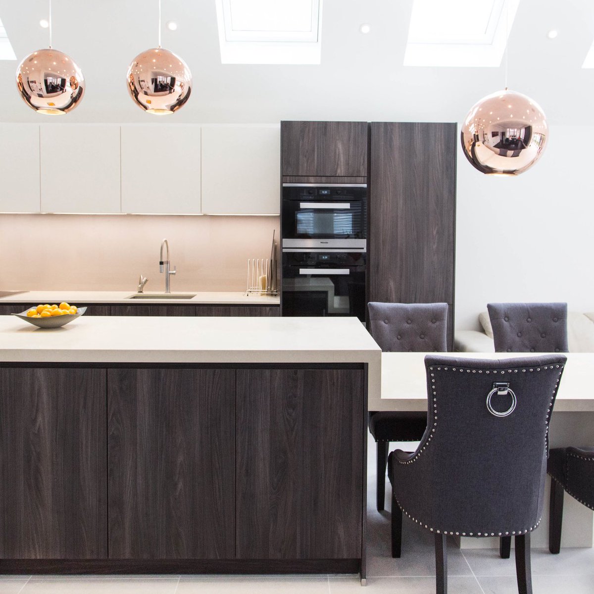 VogueKitchens's tweet photo. We designed this gorgeous open plan kitchen using cashmere and dark wood tones - the colours run from the kitchen to the dining room which bring the two spaces together 🤎 #luxurykitchens #homerenovation https://t.co/3gLocmSBDo