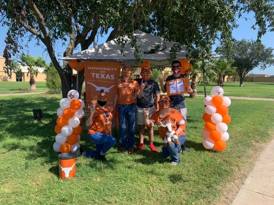 LJHSCoyotes's tweet photo. LJISD Counselors and sons (UT Class of 2023 and Future Class of 2025) ready to distribute masks to LJISD UT Class of 2024 students, compliments of Texas Exes and UT Austin. https://t.co/8D8U1otgvd